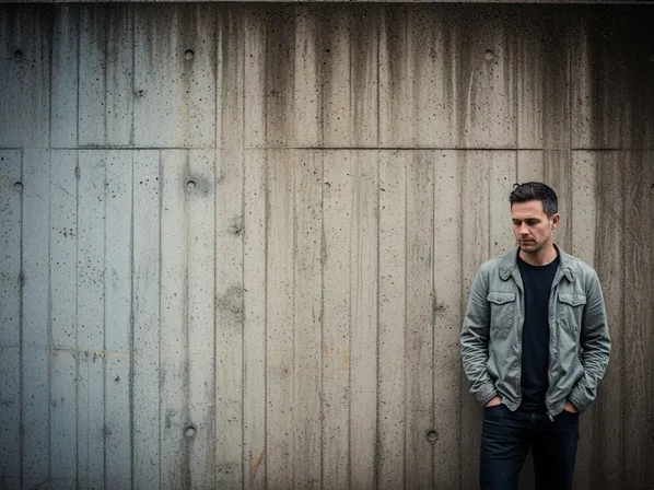 subject placed in the lower right with a large empty wall for visual breathing room, creating a more contemplative mood and stronger emotional storytelling.