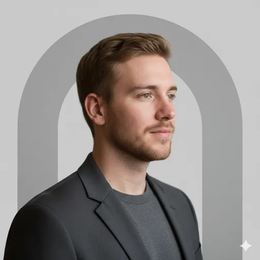 A minimalist gray studio setup with simple arch geometry—structured composition that feels clean and design-forward.